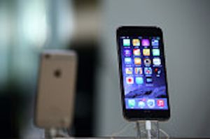 Shoppers And Product Displays Inside The Apple Inc. Store At China Central Mall