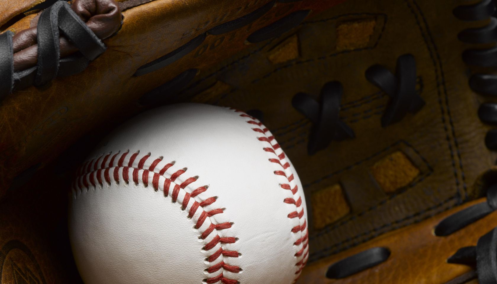 Baseball in glove close-up