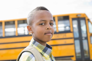Child boarding school bus