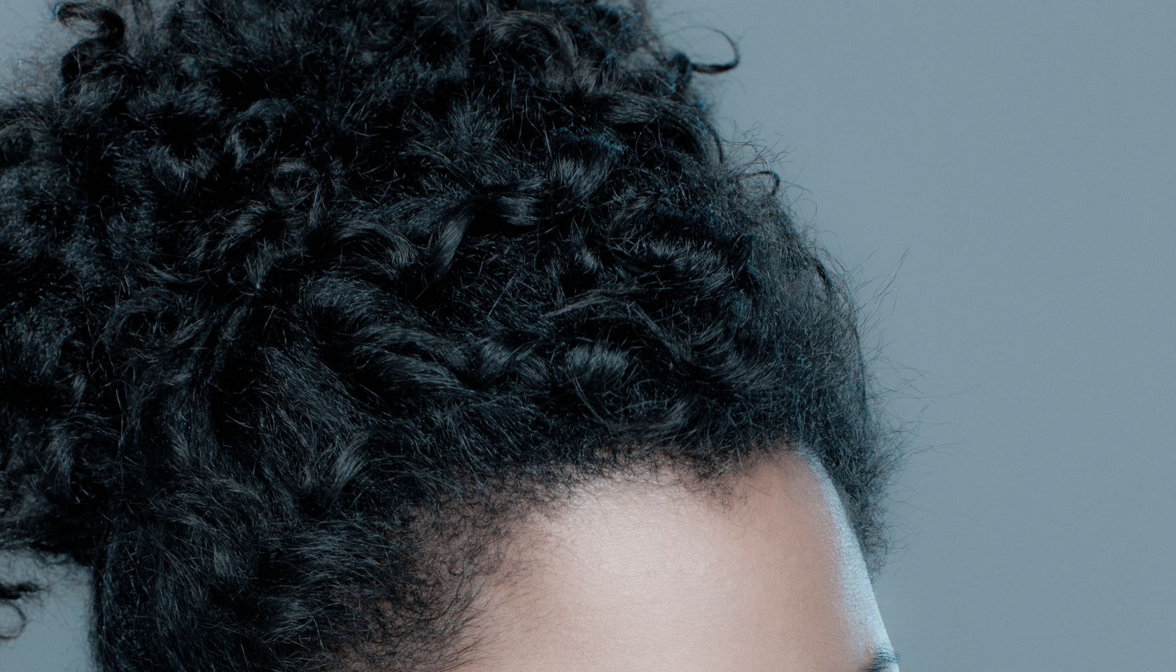 Studio shot of displeased young woman