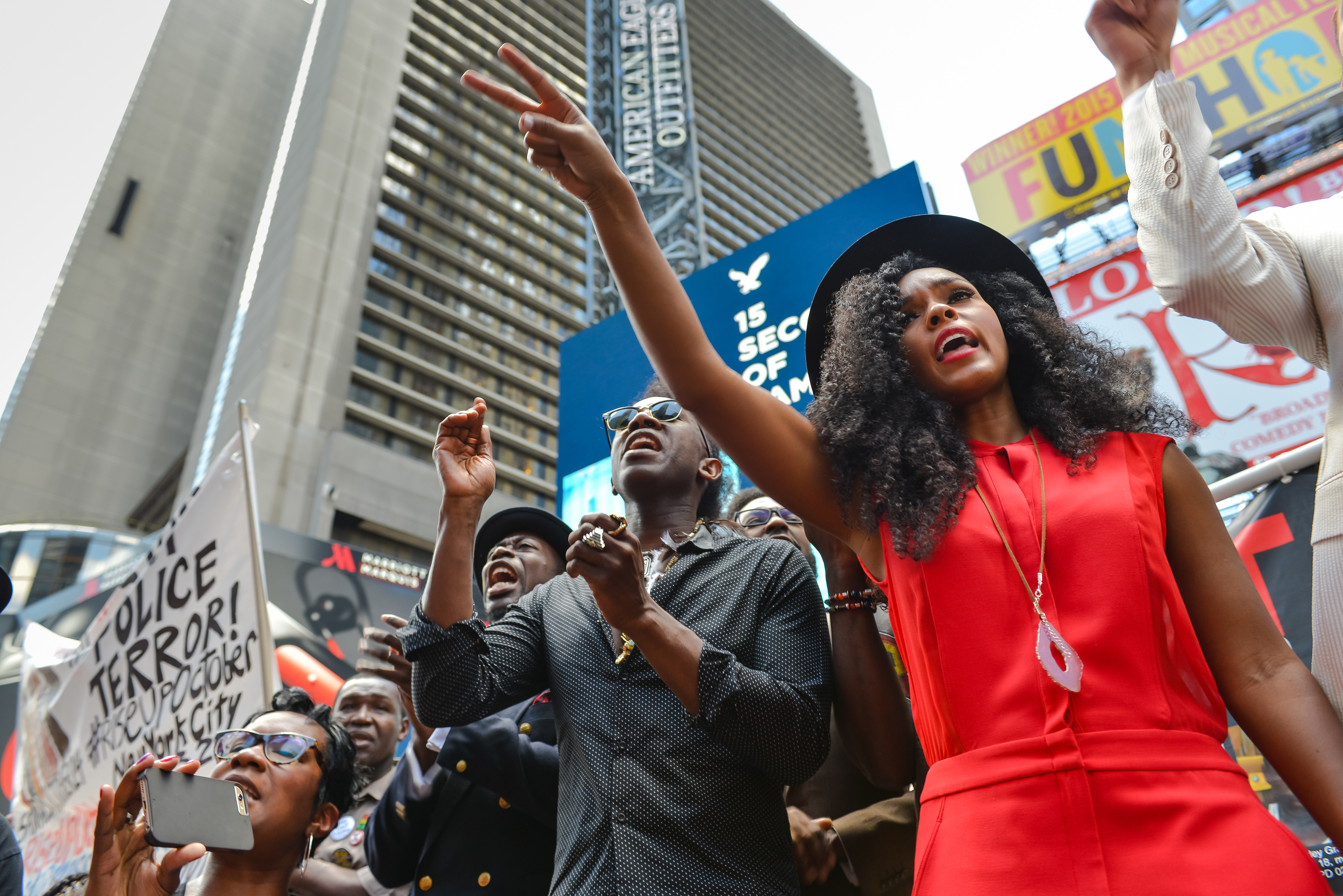 Janelle Monae (right), a singer with Wondaland, gestures...