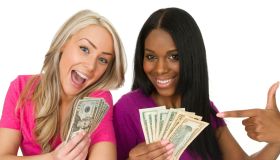 two women with money
