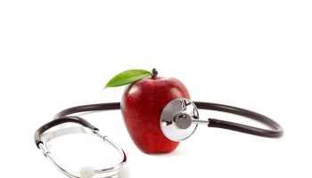 Healthcare Check-up with Apple and Stethoscope