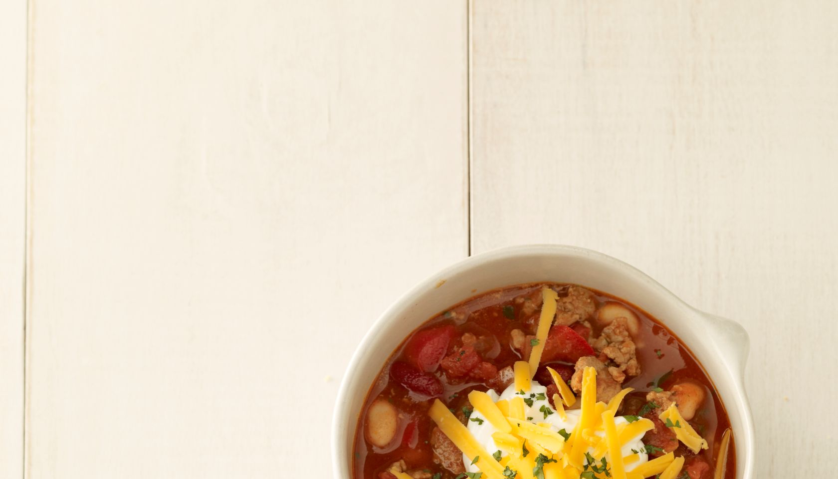 Chili in white bowls