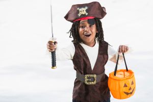 Excited little boy in halloween costume