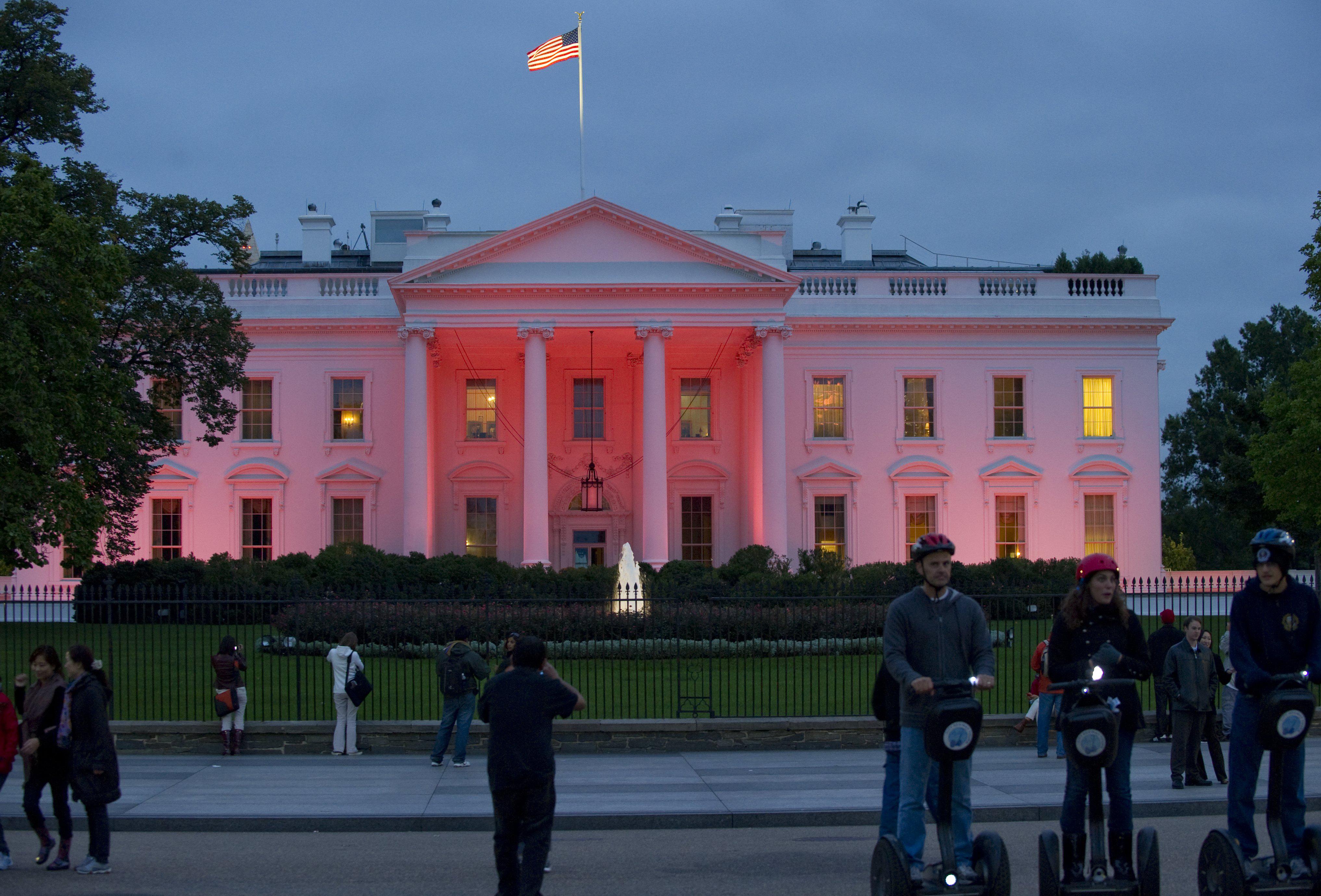 Pink lights illuminate the north side of