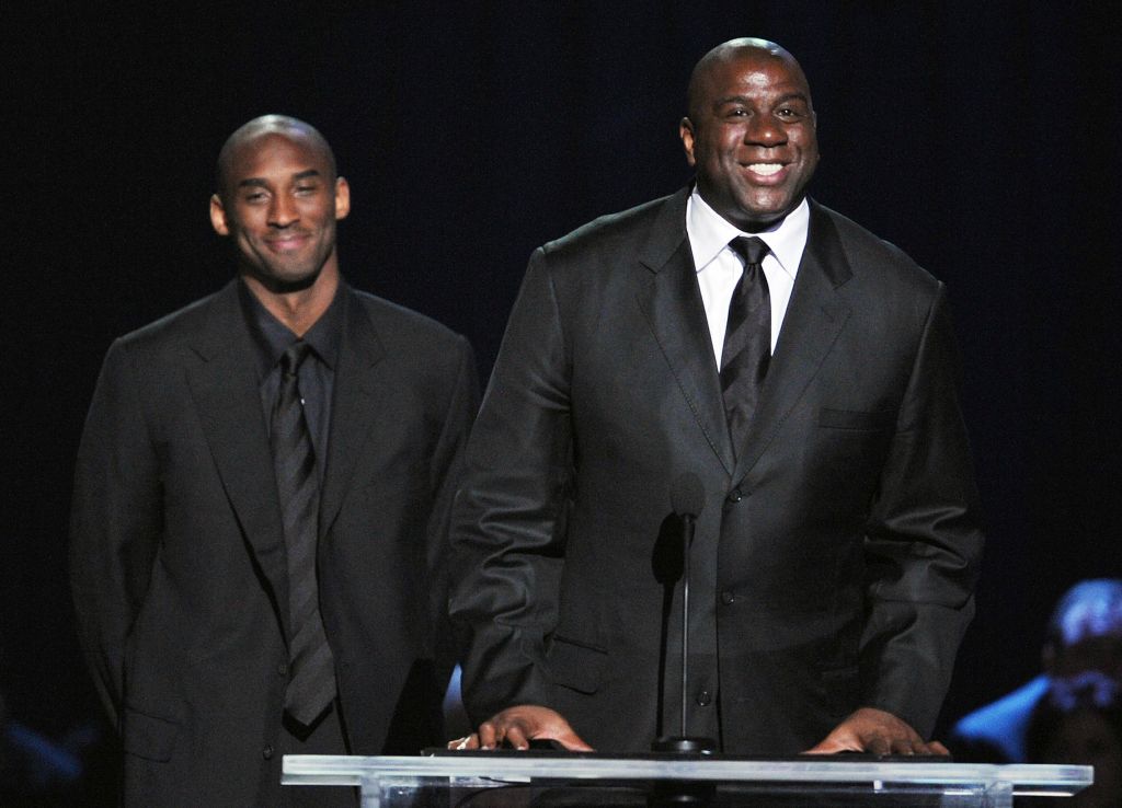 Basketball legends Kobe Bryant (L) and M