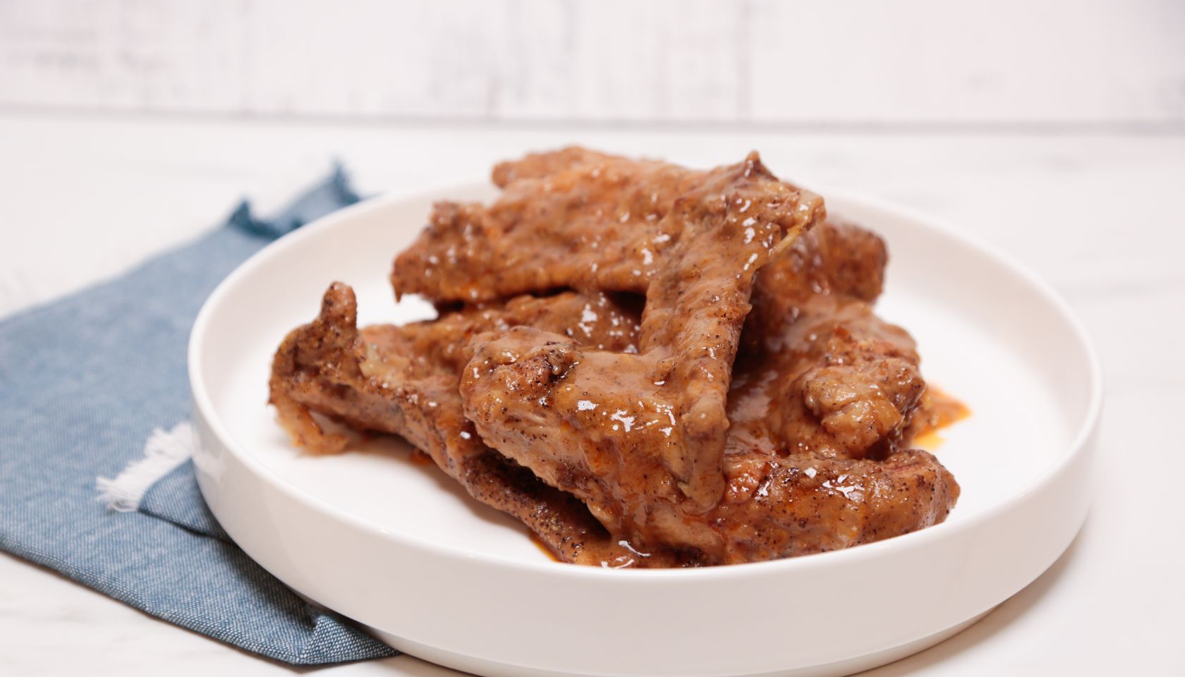 Smothered Turkey Wings with Caramelized Onions