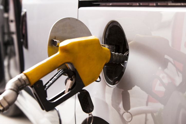 A car being refueled at the gas station.