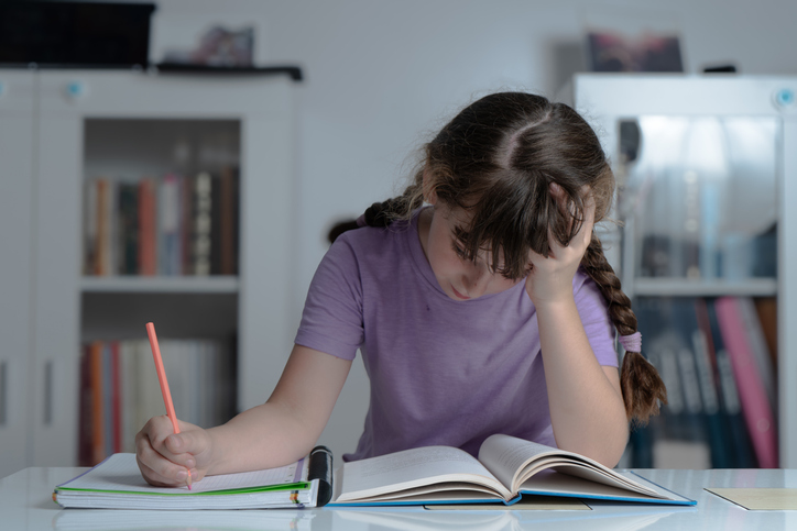 girl doing school homework