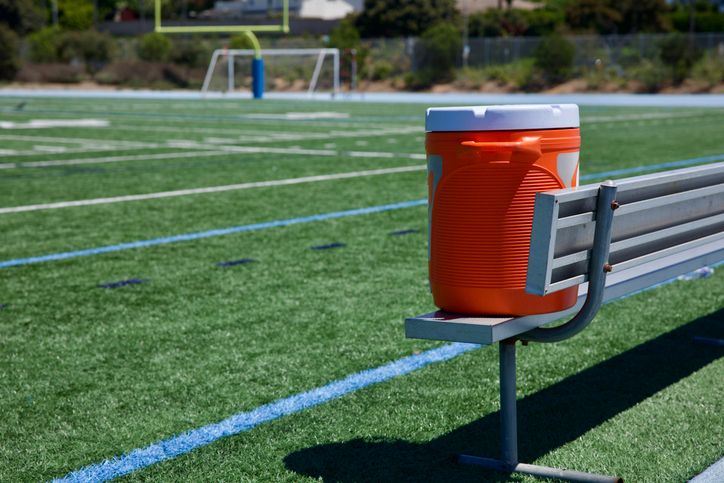 Water cooler on the football field sideline