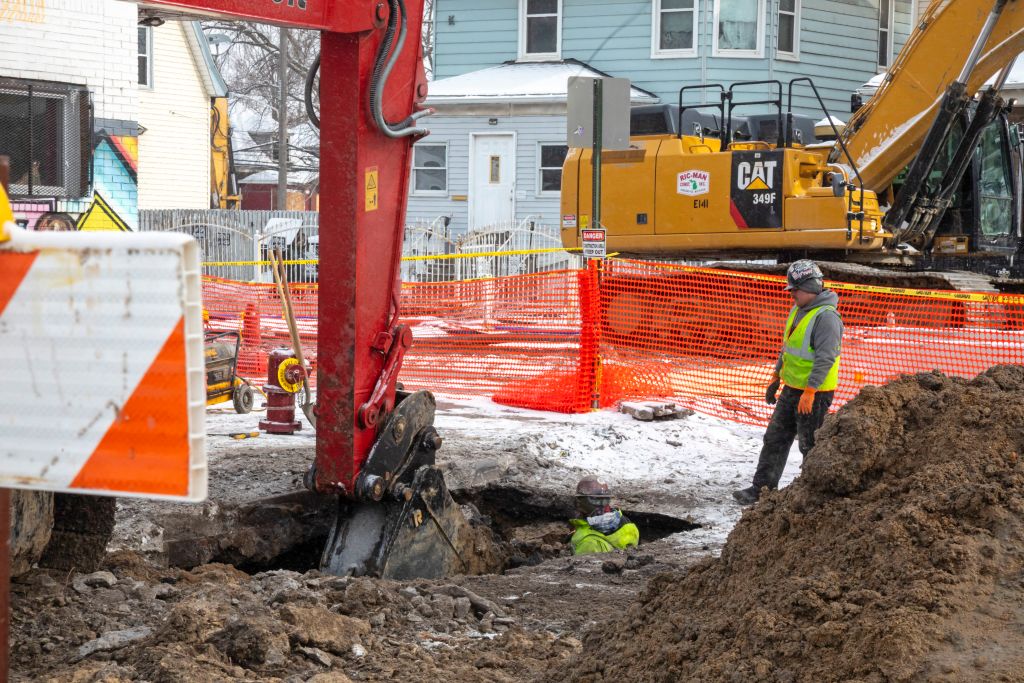 Workers Repair Water Main Break