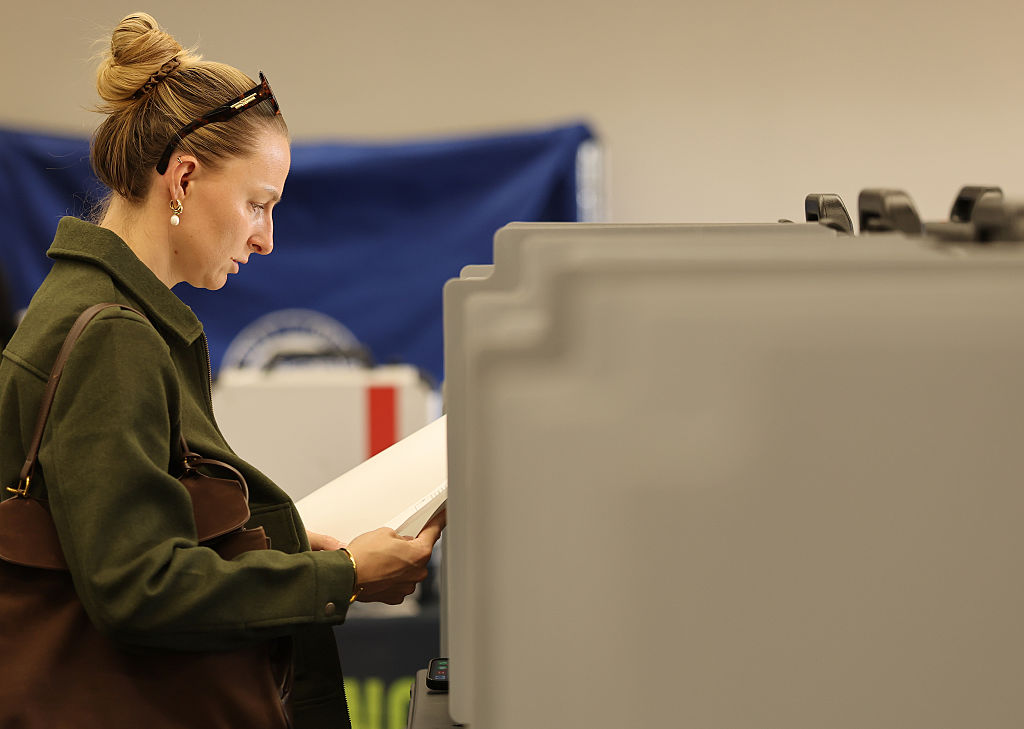 Voters cast their ballot in the California Statewide Special Election