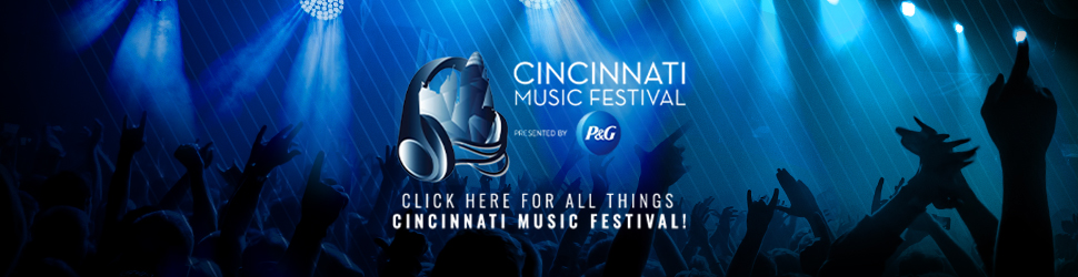 Cincinnati Music Festival logo and stage with silhouetted crowd in front of blue lighting and spotlights.