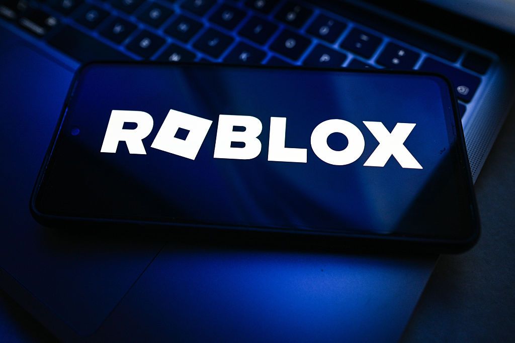 In this photo illustration, a Roblox logo is seen displayed